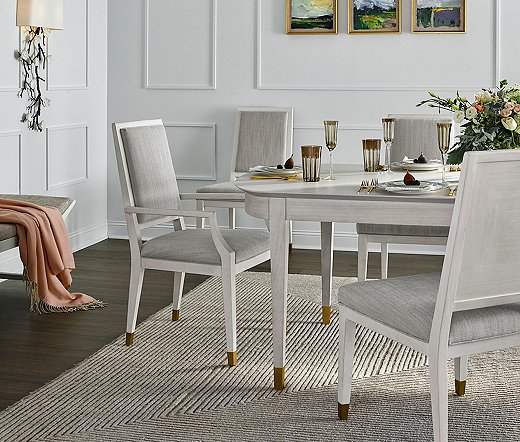 Miranda insisted that the wood along the top of the Marion Extension Dining Table and on the backs of the Love Joy side chairs and armchairs, among other pieces, be laid so that the grain created geometric patterns.
